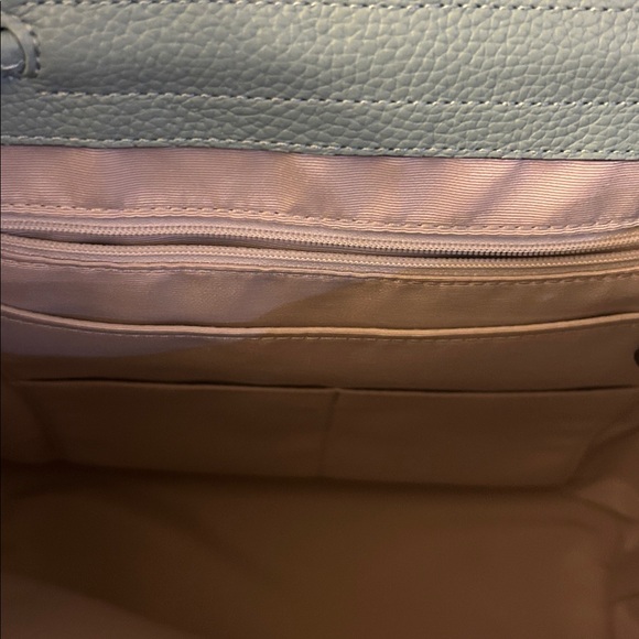 Kate Spade New York Sinch medium flap backpack. The color is light blue, EUC - Picture 10 of 11